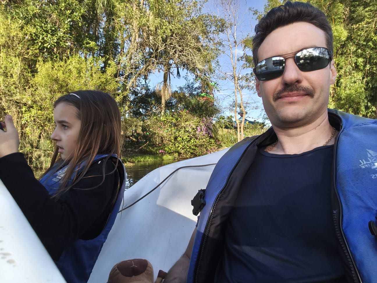 Raphael and his daughter on a boat trip