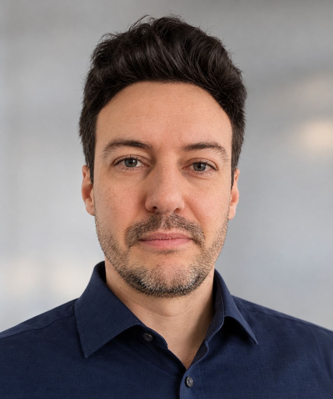 Portrait of Raphael Bohrer, Senior Software Engineer, wearing a navy shirt